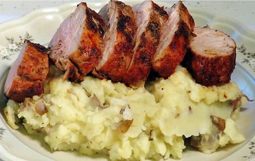 pork tenderloin serving with mashed potatoes